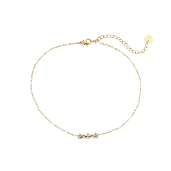 Chaîne de cheville dorée Diamond Starfruit Trio Dottilove en acier inoxydable avec trois pendentifs étoiles en zirconium, 23cm + 5cm - Bijoux Les Trésors d'Emma 974 Réunion.